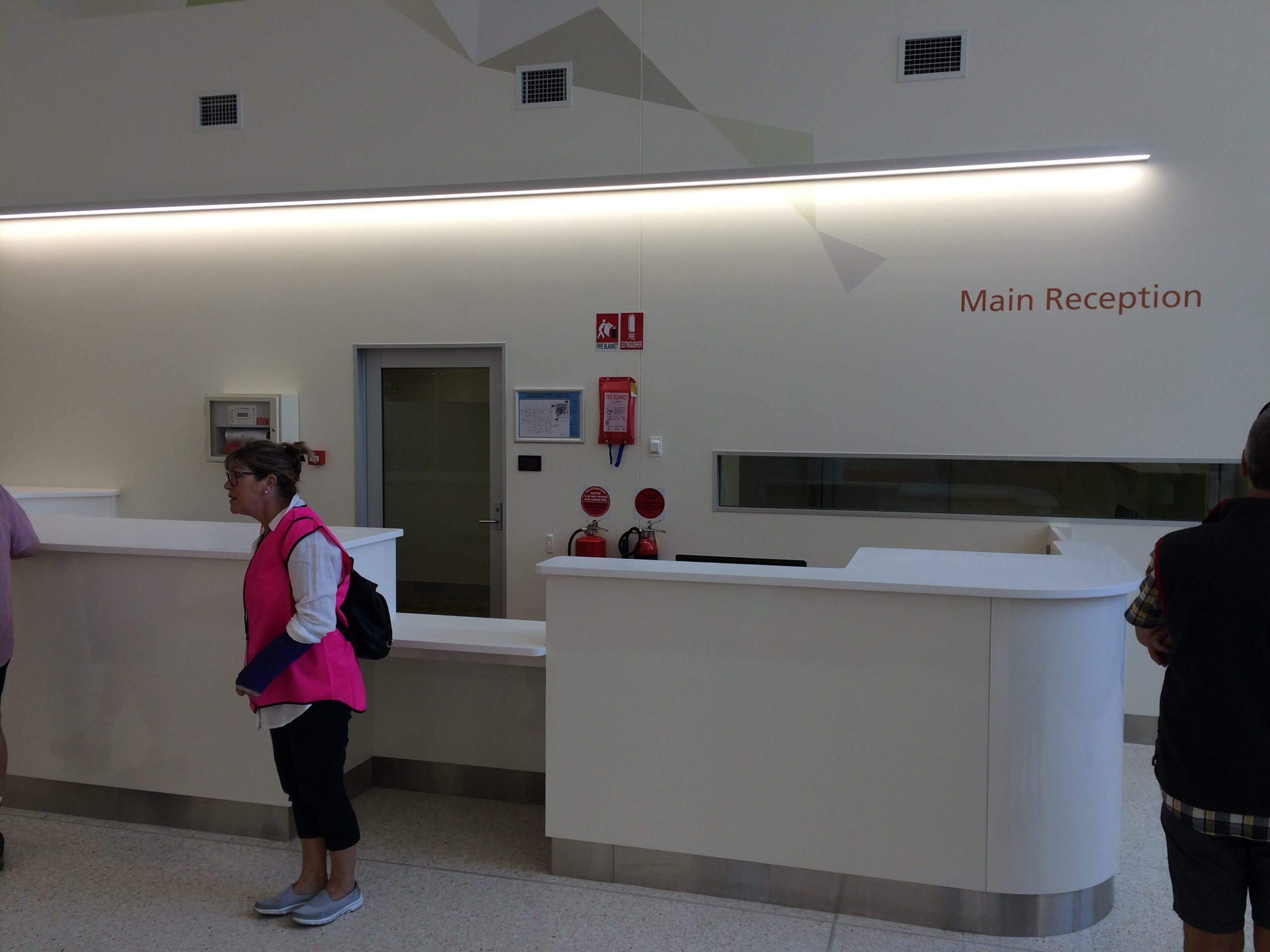 A hospital main reception desk.