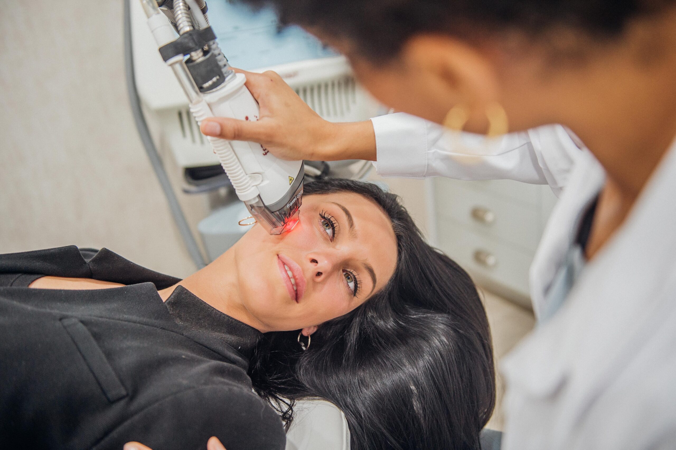 A laser skin treatment being demonstrated.