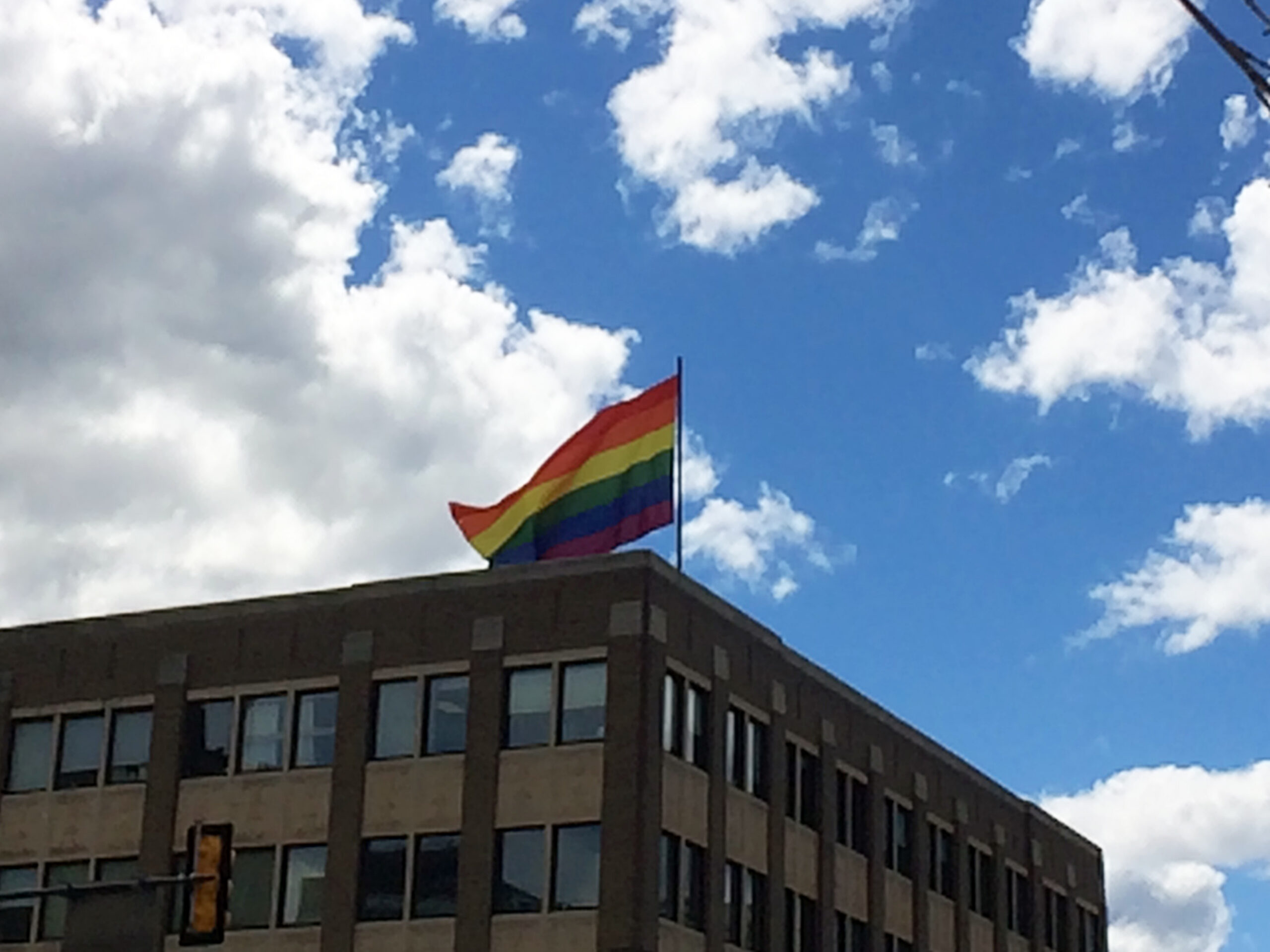 A rainbow flag displayed in public.