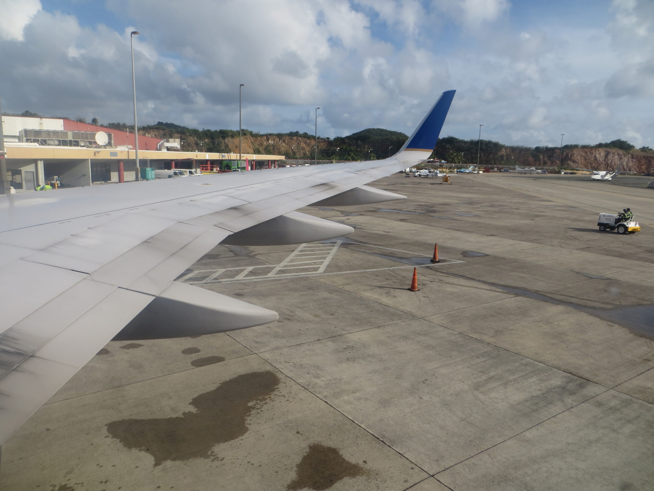 An aircraft seen from an airport departure gate.