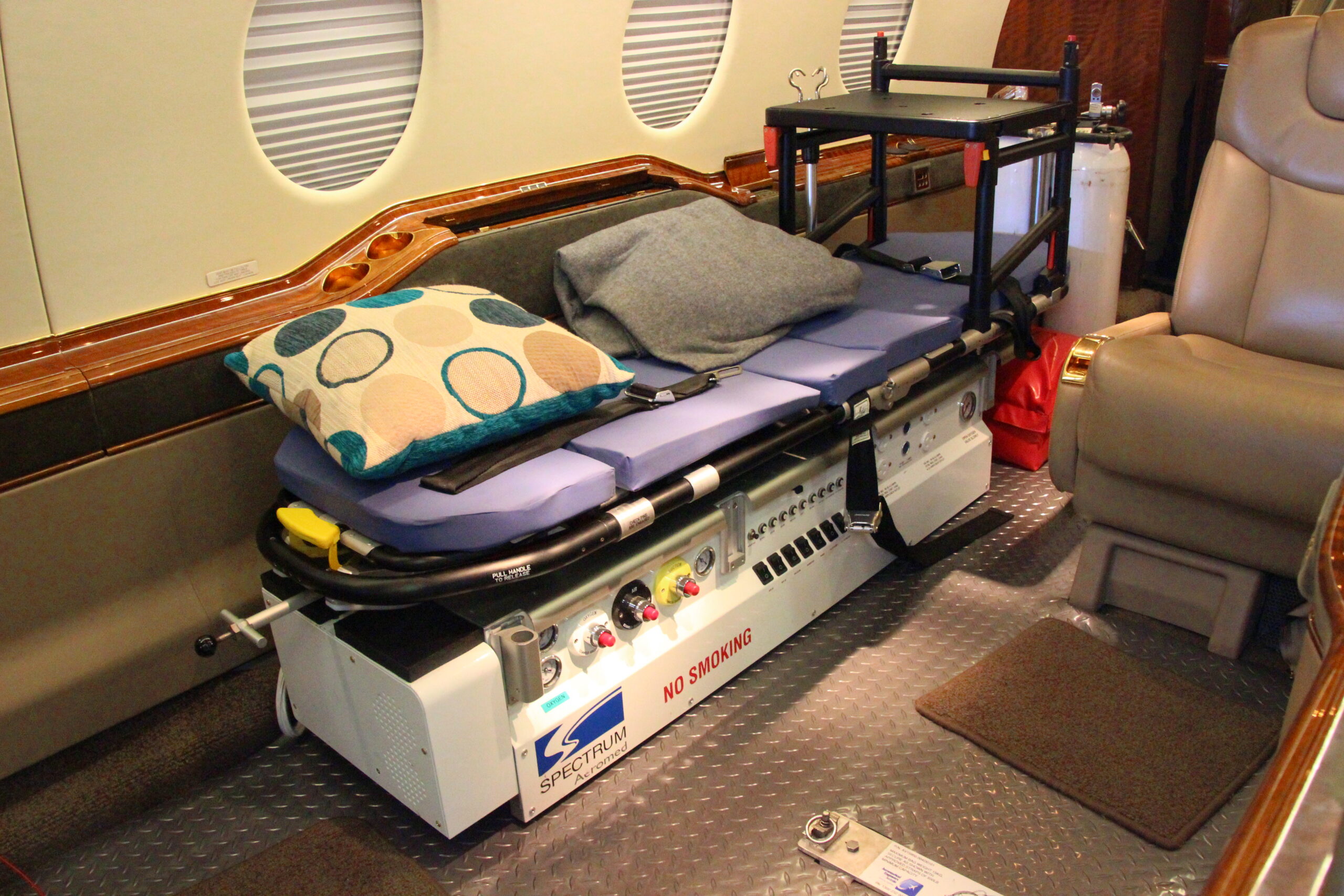 The passenger cabin of a business jet fitted out as an air ambulance