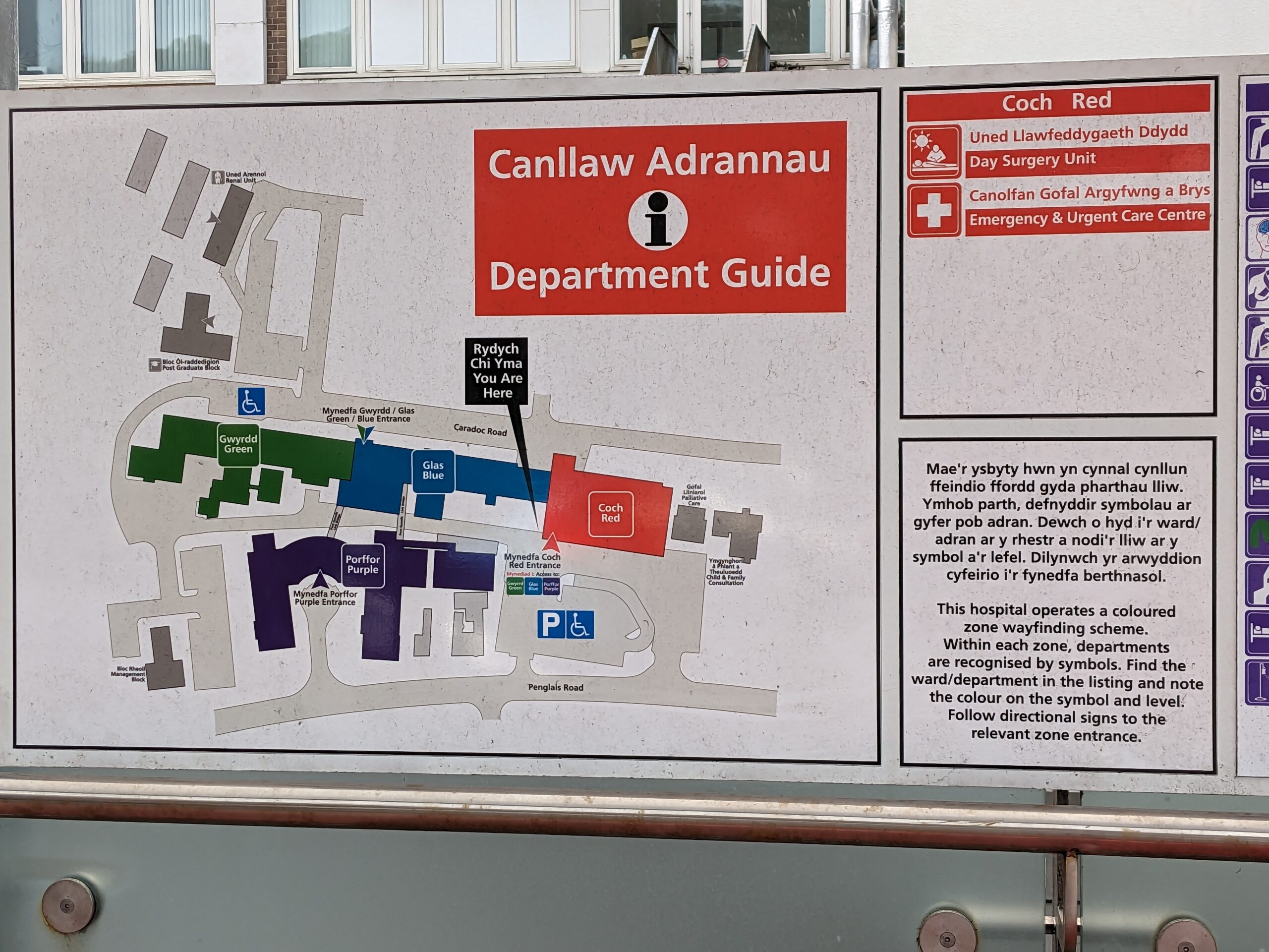 A hospital department map and written guide displayed for patients