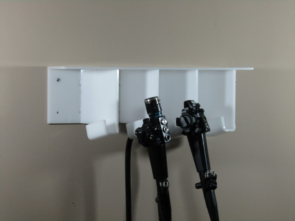 Flexible endoscopes on a wall-mounted storage rack