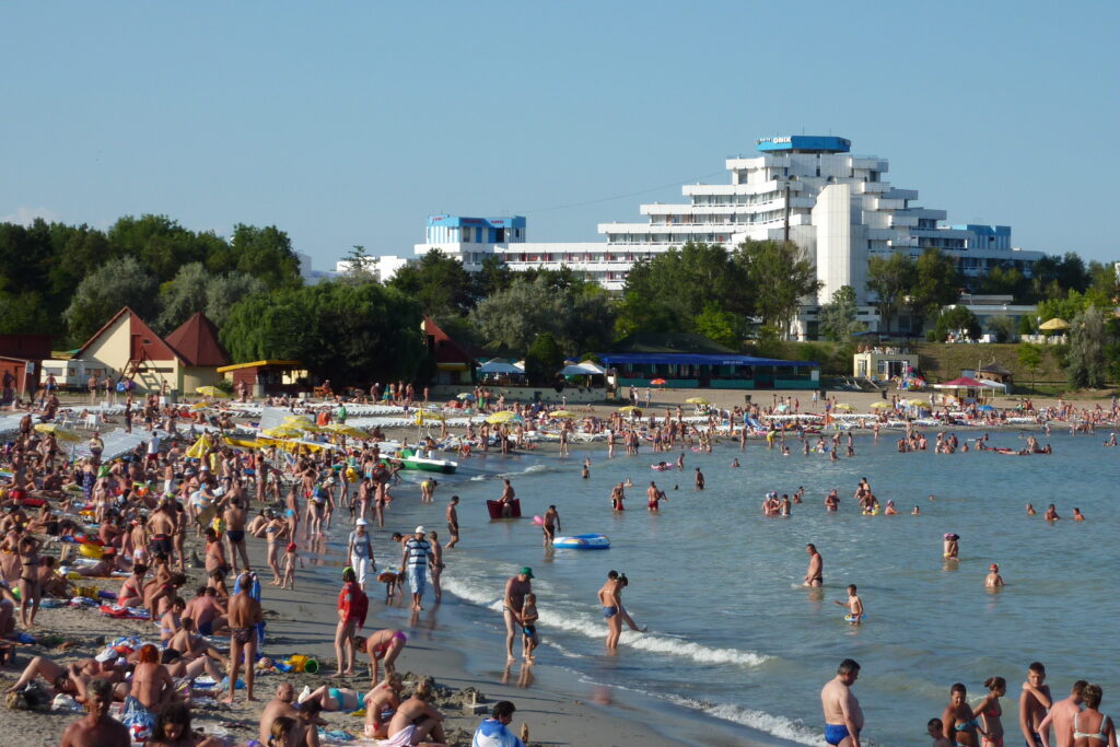A crowded beach at a seaside resort in high summer