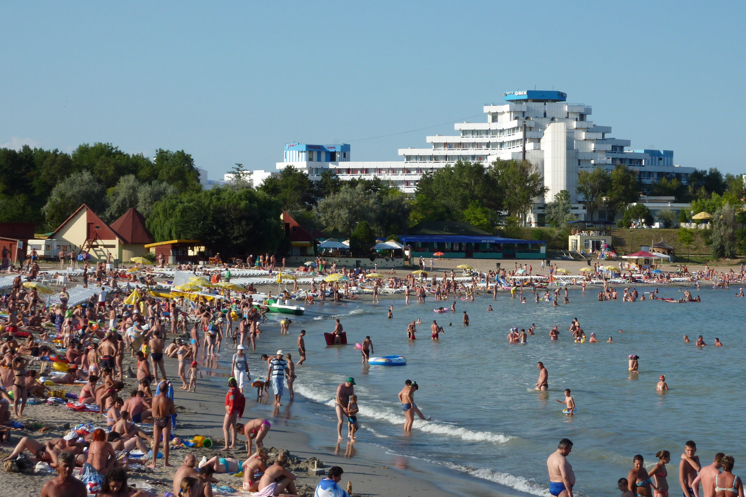 A crowded beach at a seaside resort in high summer